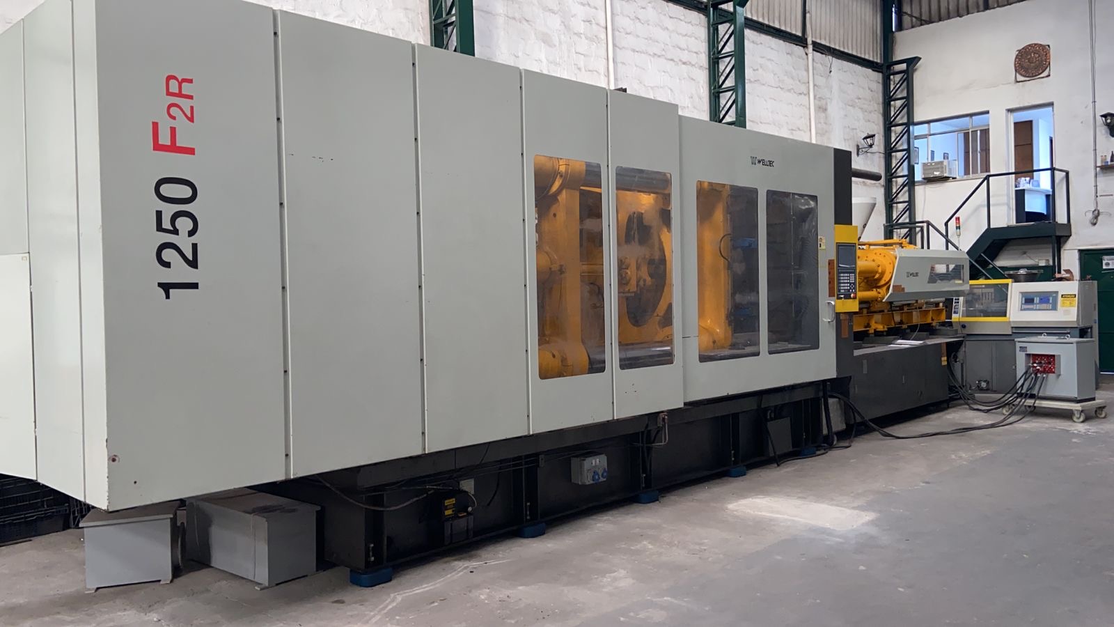Máquina Injetora Welltec 1250ton, ano 2008